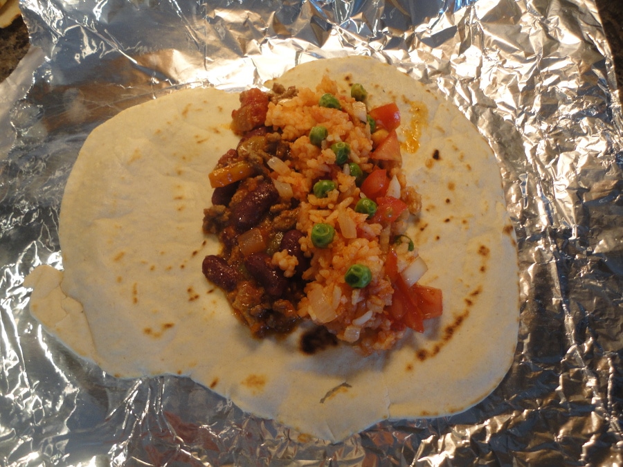 This Mexican beef and bean burrito is a cheap, easy to make recipe that is perfect for a Saturday night with the family. Delicious! 