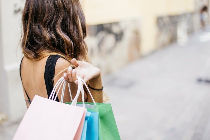 woman shopping with bags