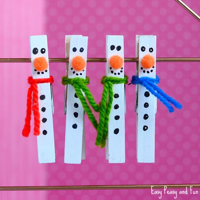 With a couple of wooden clothes pegs and some white paint, you can have some cheeky snowmen who'd look great on your Christmas tree.