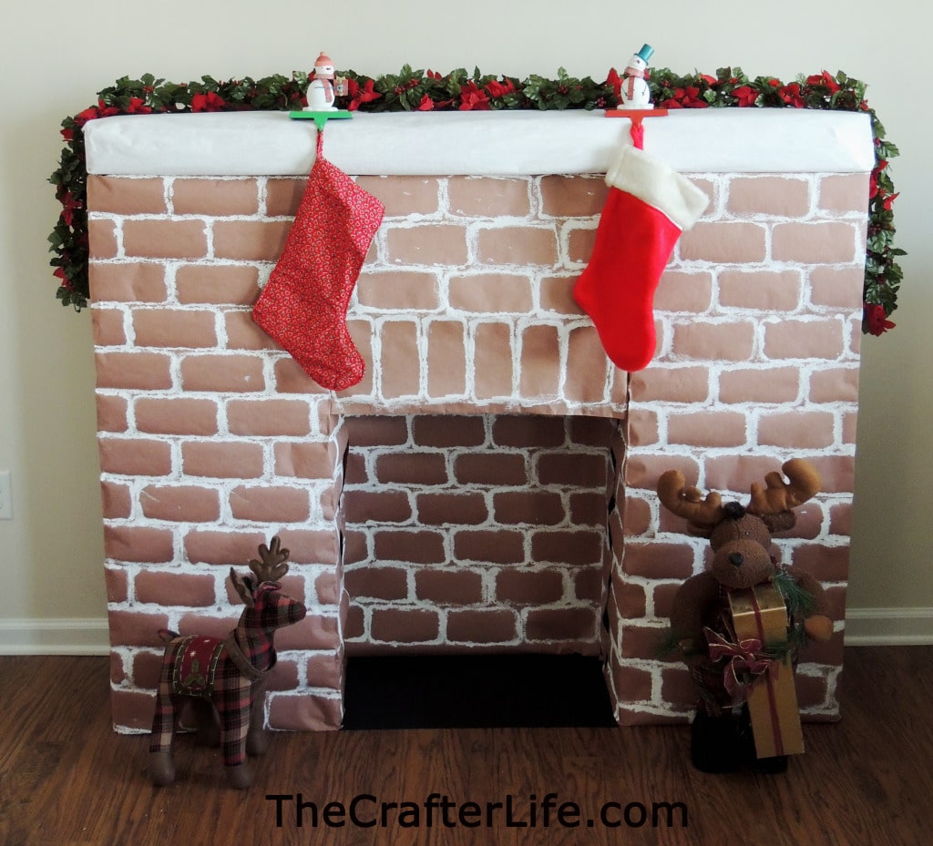 Don't miss out hanging your Christmas stocking - make a cardboard fireplace instead.