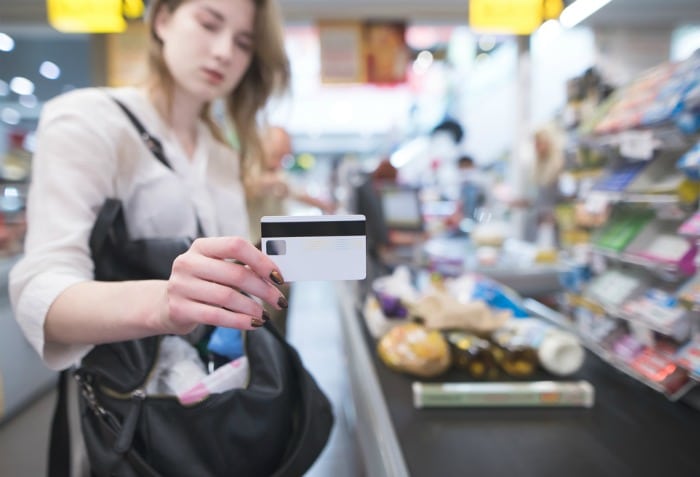 paying at the supermarket