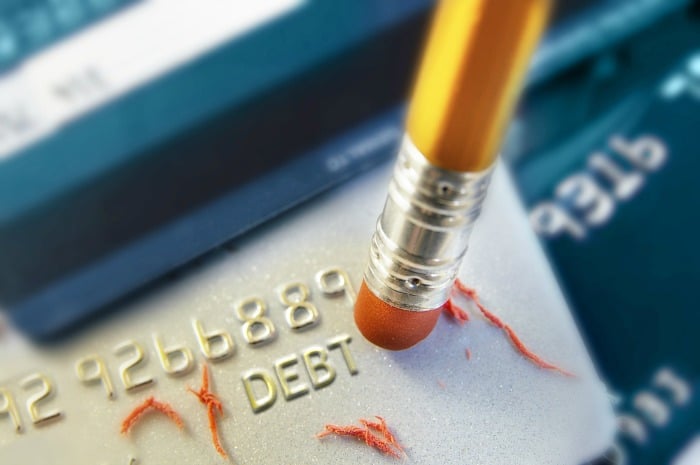pencil erasing credit card debt