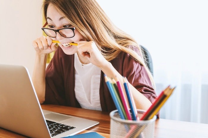 woman studying with a laptop