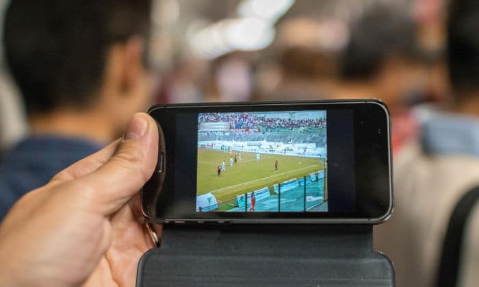 Watching a football match on mobile phone