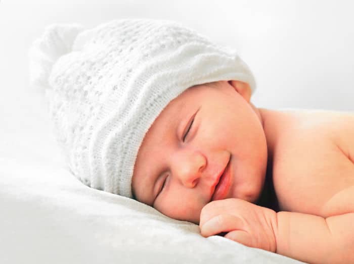 smiling newborn baby