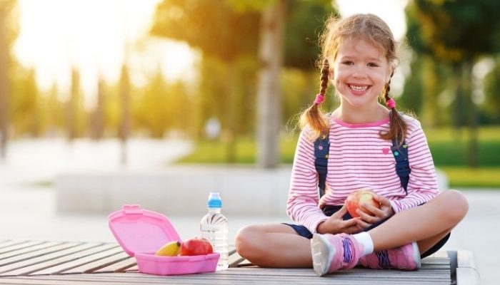 girl eating packed lunch
