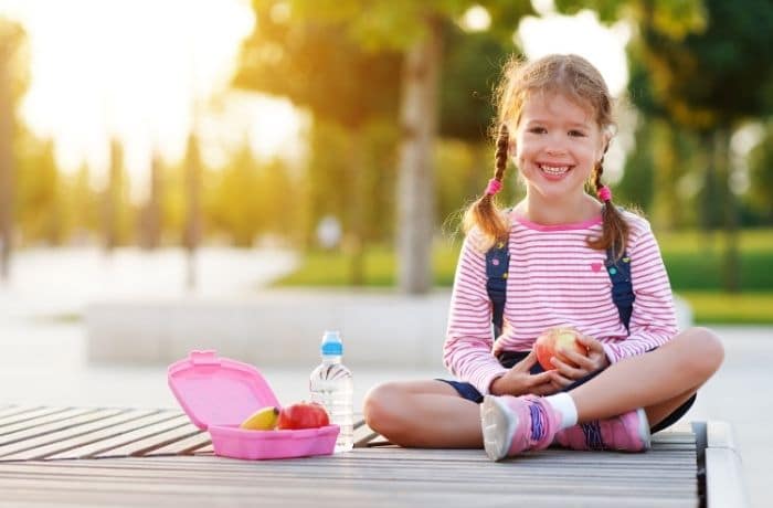girl eating packed lunch