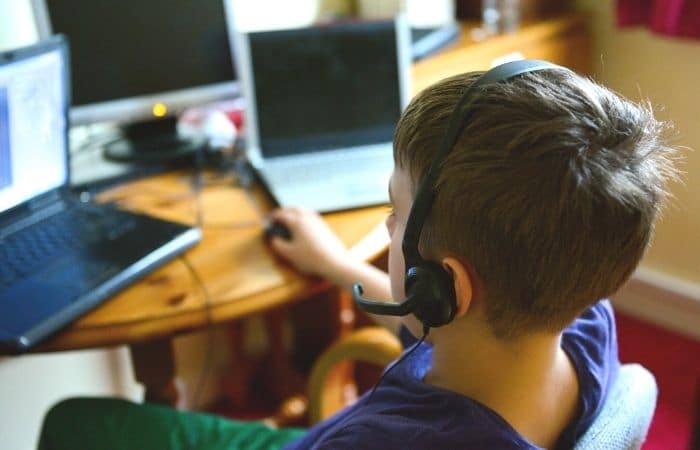 child playing a computer game