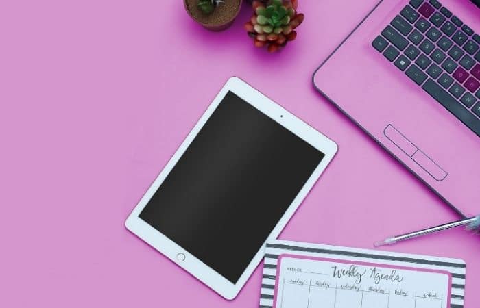 ipad on a pink desk