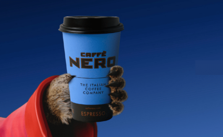meerkat holding a caffe nero takeaway cup
