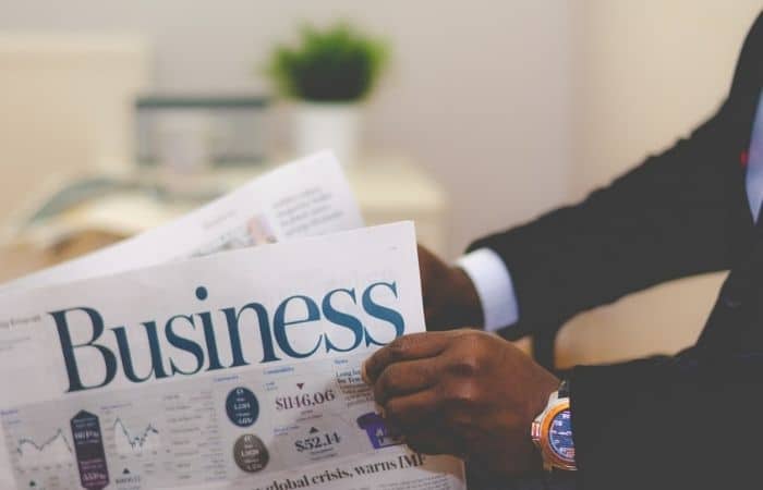 businessman holding a paper