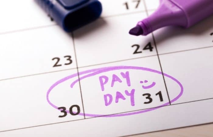 pay day written on calendar with date circled