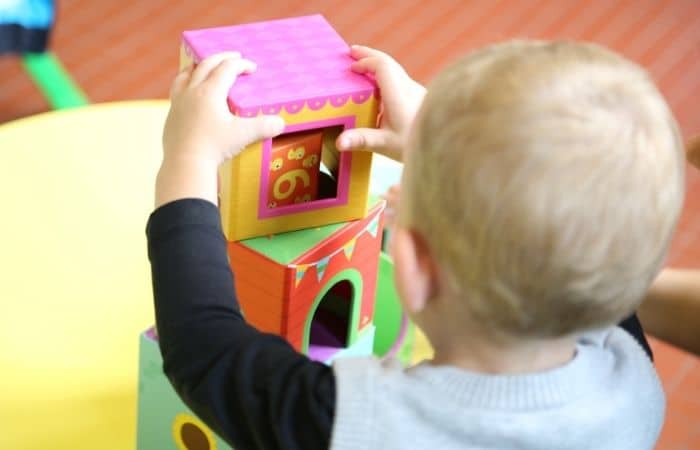 baby playing with blocks