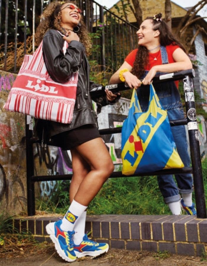 women holding lidl by lidl bags