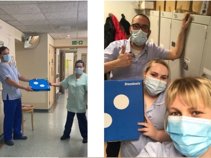 nhs staff holding boxes of pizza