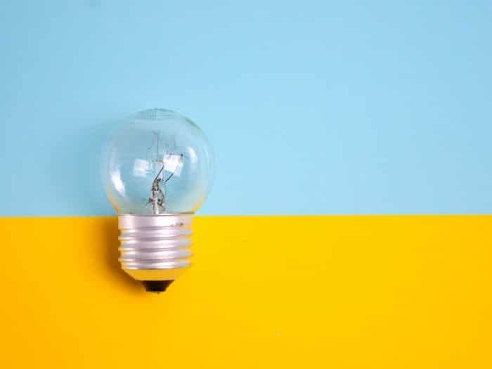 lightbulb on colourful background