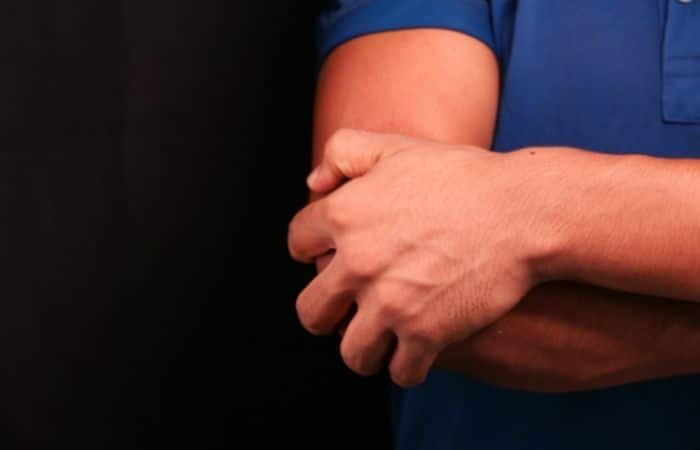 man with elbow pain