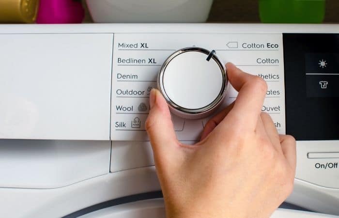 adjusting setting on tumble dryer