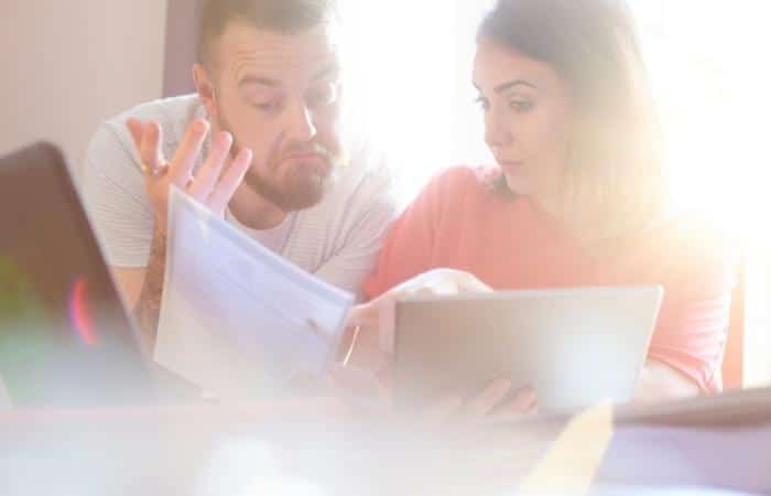 couple looking at bills