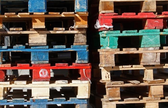 Stacked empty wooden pallets