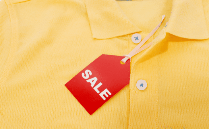 red sale lable on a yellow tshirt