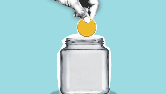cartoon hand placing coin in a jar