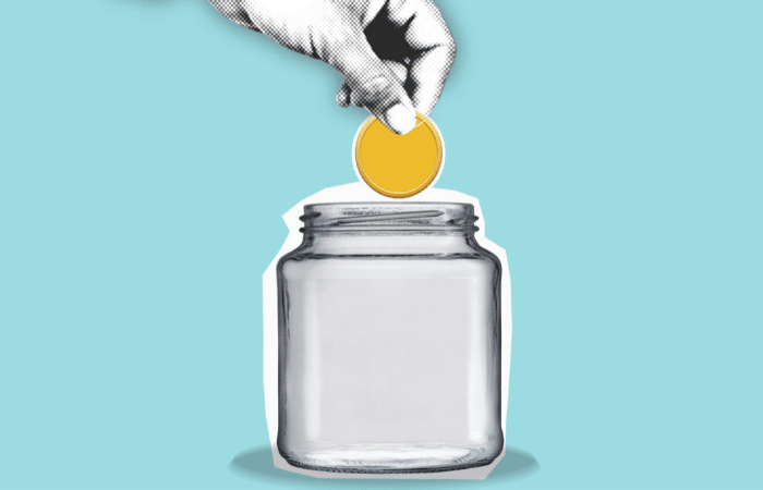 cartoon hand placing coin in a jar