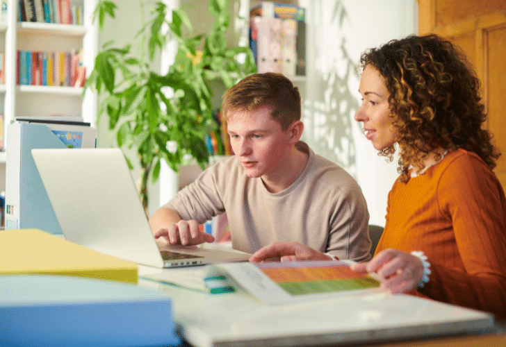 woman teaching a student