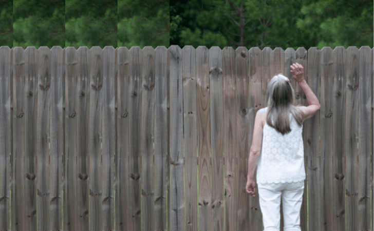 woman at fence