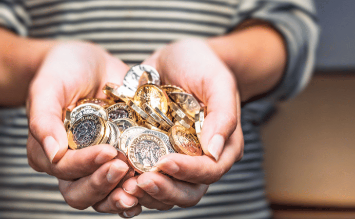 hands holding coins