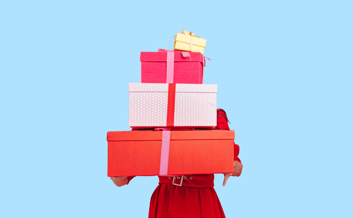 woman holding Christmas presents