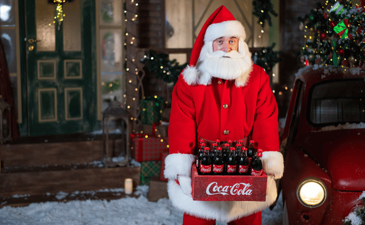 santa holding cola