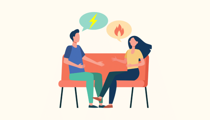 Cartoon of two people sitting on a sofa with speech bubbles above their heads. There is a gas flame symbol in one and an electric spark in the other.