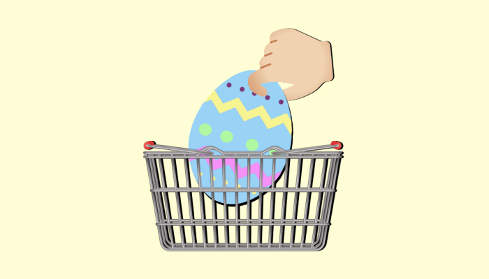 cartoon of a hand placing an Easter egg in a shopping basket