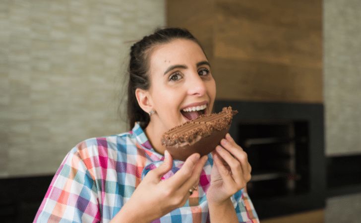 woman eating an easter egg