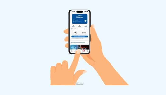 cartoon hands holding a phone while using the Tesco Clubcard app