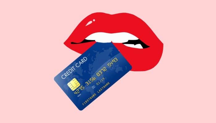Cartoon of a credit card being held in a mouth with bright red lipstick