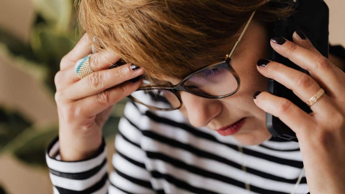 Women on phone looking anxious