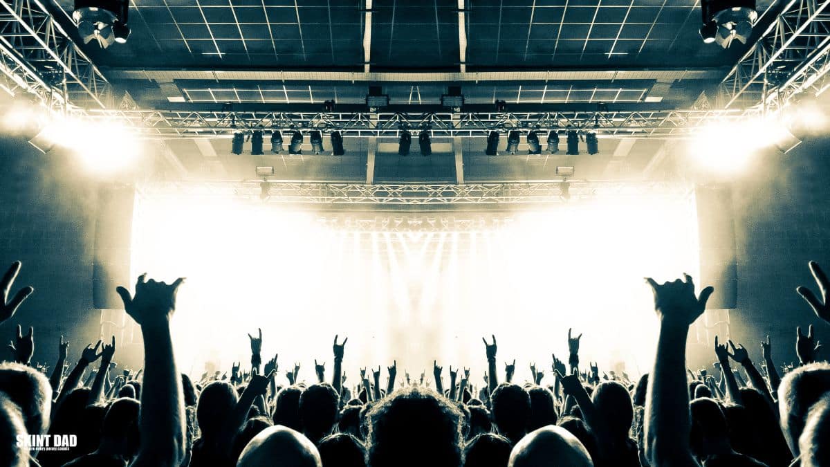 People at a a concert where ticket touts have been selling tickets at an inflated price.