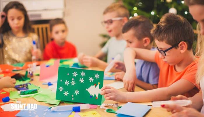 kids making handmade christmas cards