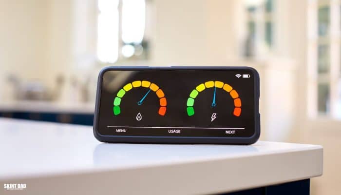 Smart meter in a British home showing rising energy usage, reflecting Ofgem’s £28 billion grid upgrade and the impact on household bills