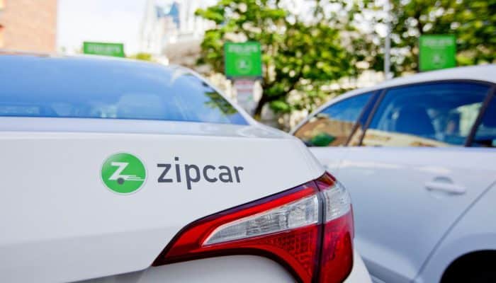 Close up of a Zipcar vehicle in a UK car sharing bay, used for a news story about Zipcar shutting down its UK service.