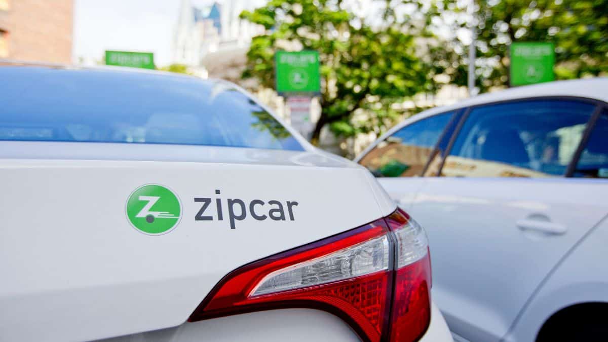 Close up of a Zipcar vehicle in a UK car sharing bay, used for a news story about Zipcar shutting down its UK service.