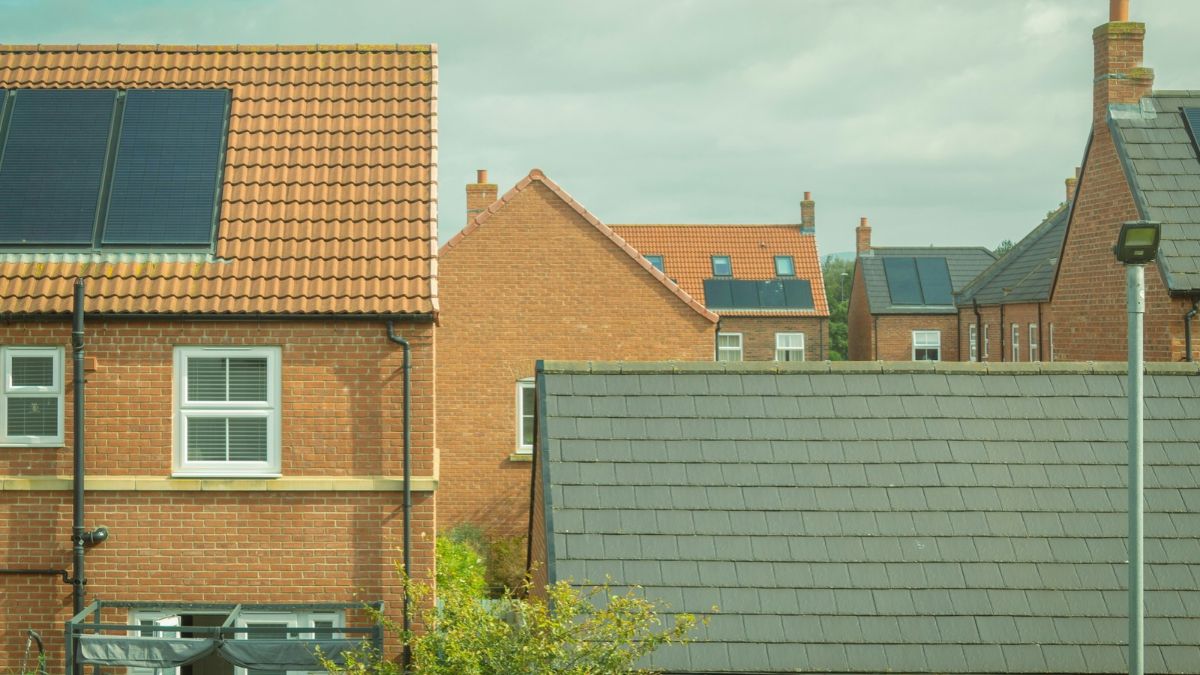 Houses in England with solar panels fitted to their roofs